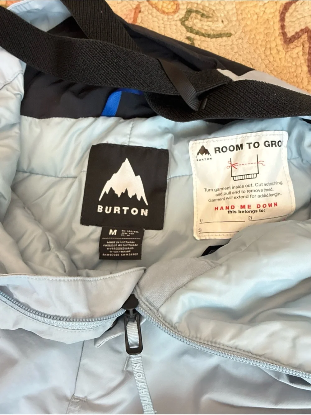 Burton Light Blue Snow Bibs Girls Size 10.  “Room to grow” feature.